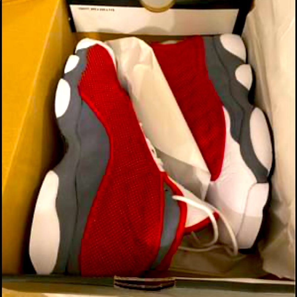 Jordan Retro 13 Flint Red 7y woman’s 8.5